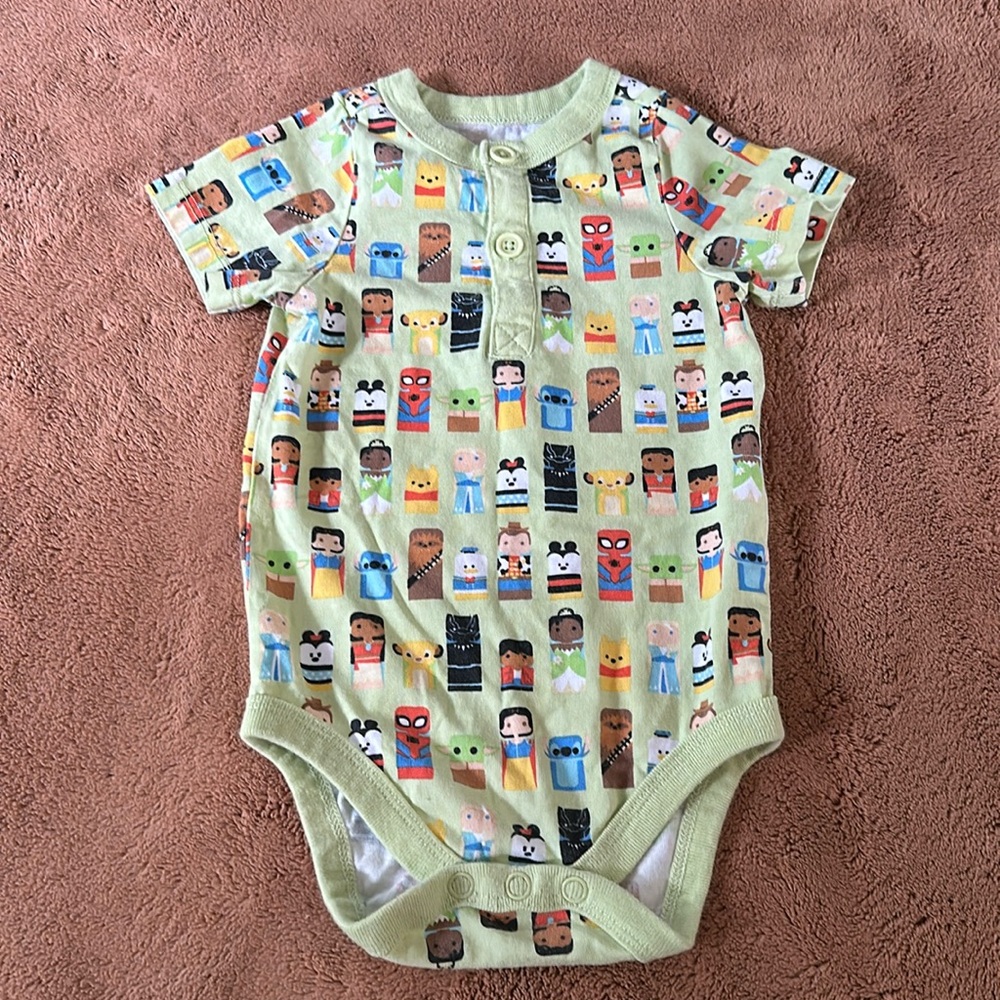 Disney green character print onesie. 100% cotton.
